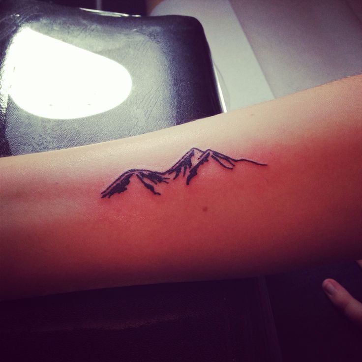 Simple Small Mountains Tattoo On Forearm