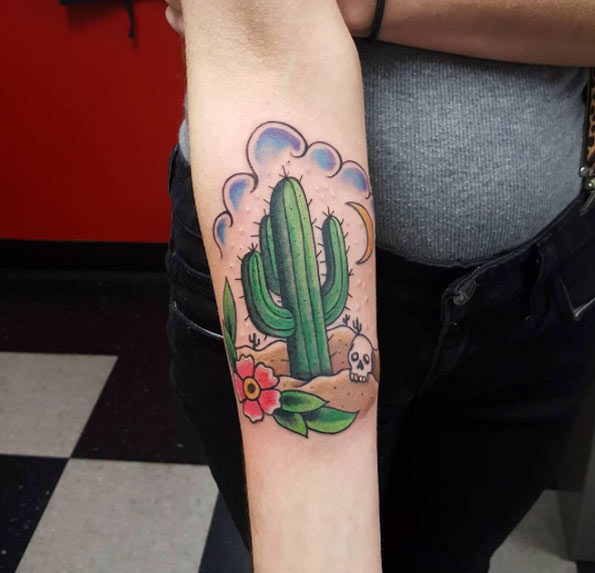 Skull With Saguaro Cactus Plants And Half Moon Traditional Tattoo On Forearm