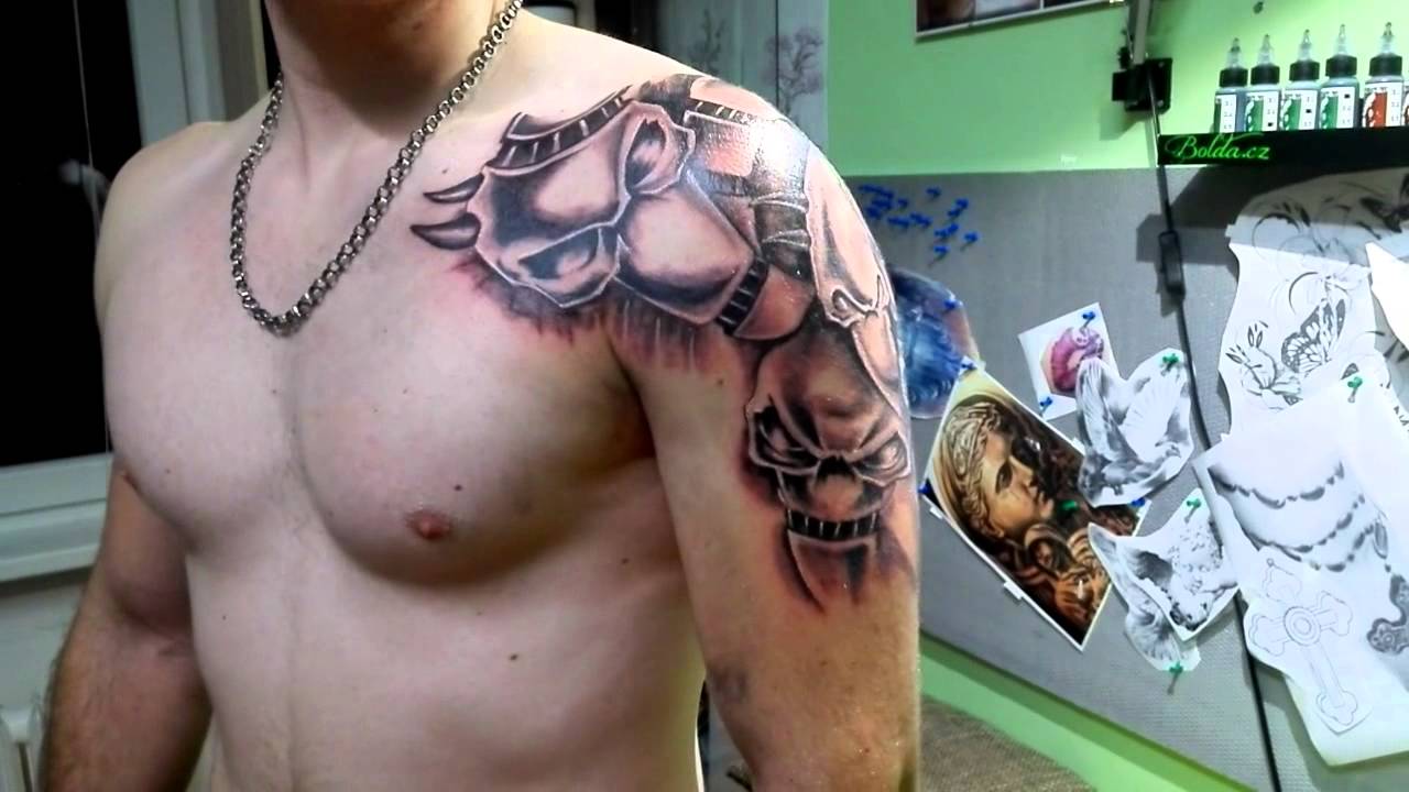 Slipknot Black And Grey Masks Tattoo On Left Shoulder