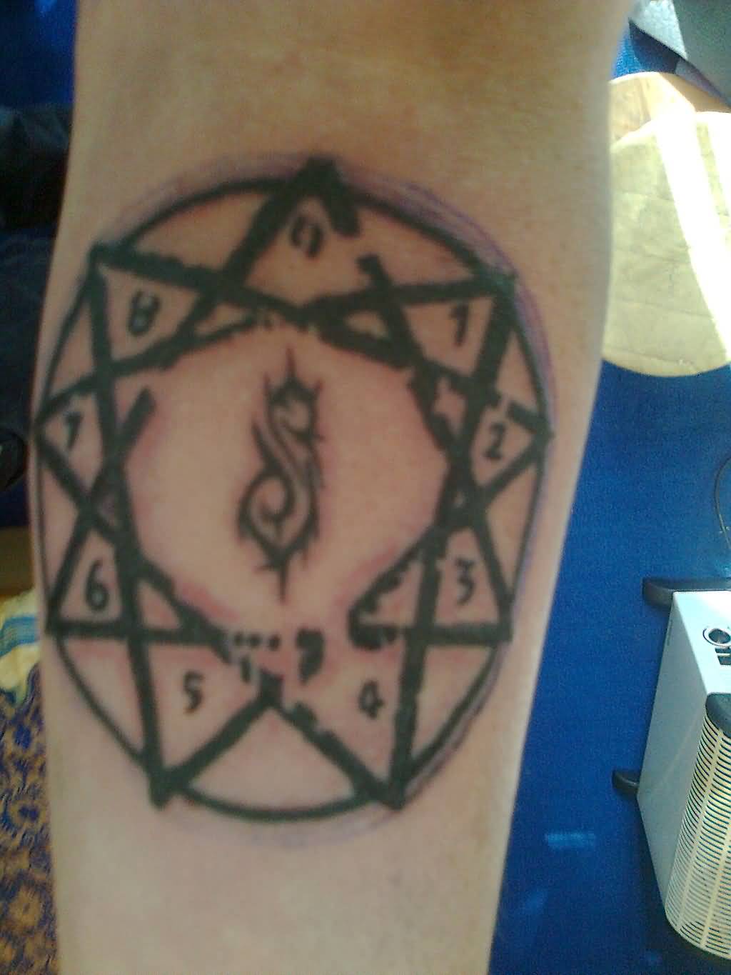 Slipknot Logo With Star Tattoo On Forearm