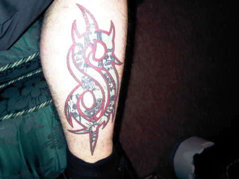 Slipknot Members In Tribal Logo Tattoo
