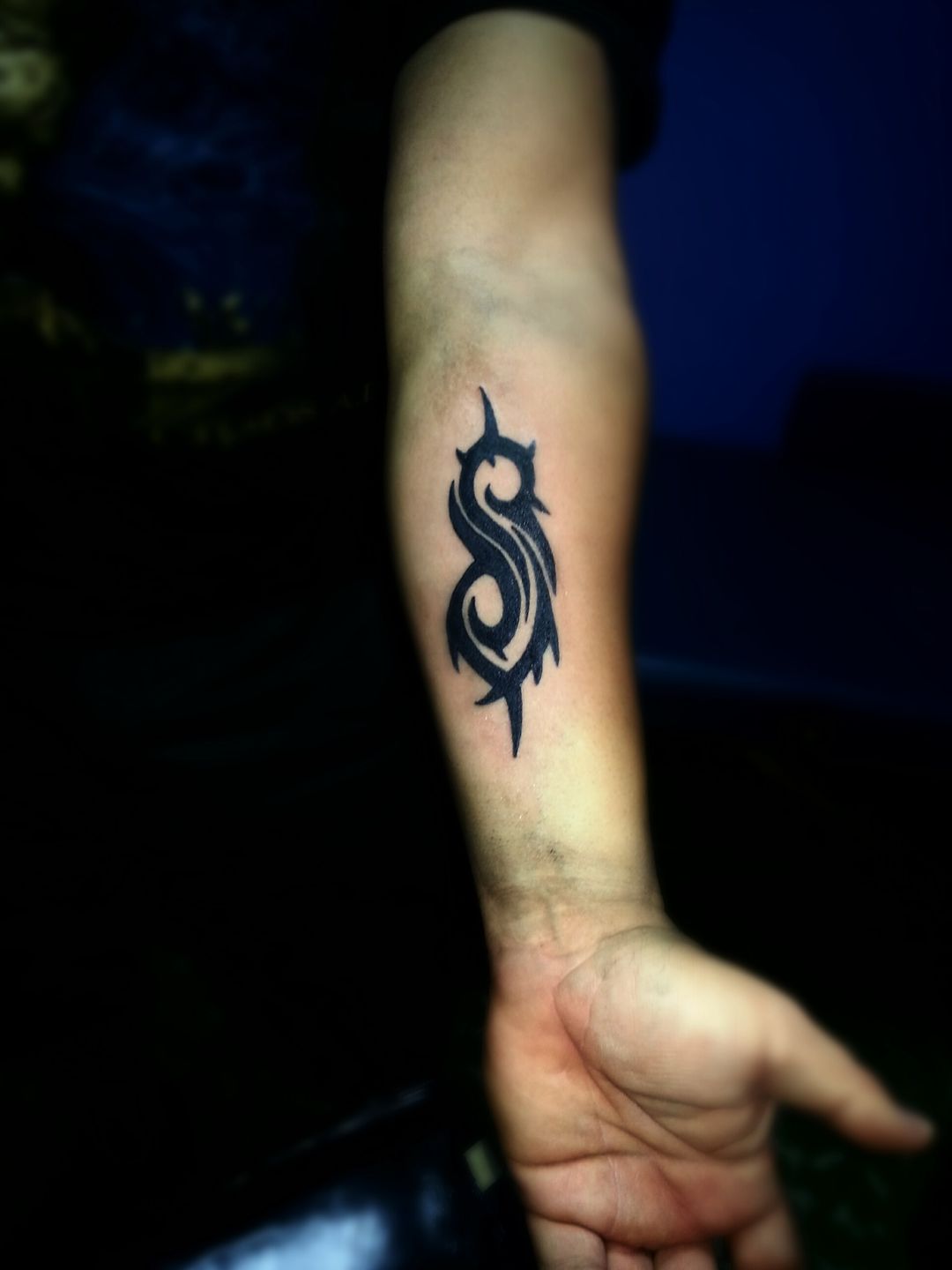 Slipknot Tribal Logo Forearm Tattoo