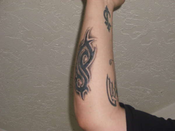 Slipknot Tribal Logo Tattoo On Arm Sleeve