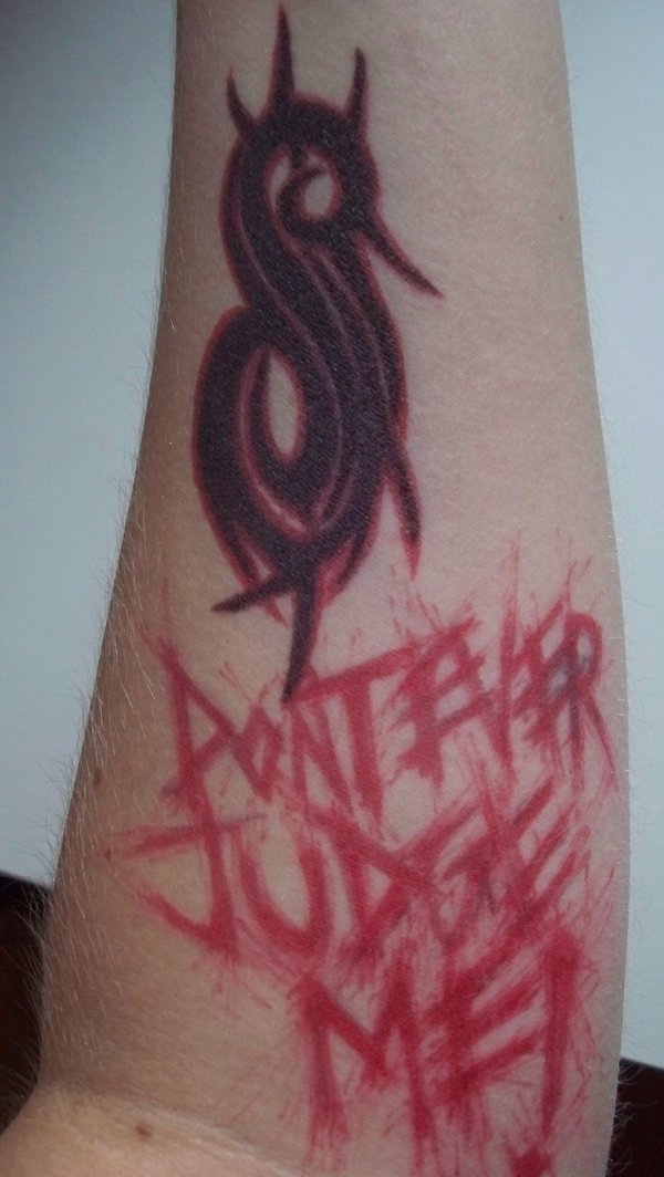 Slipknot Tribal Logo Tattoo On Forearm