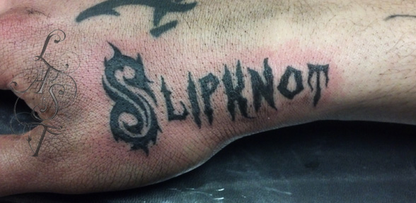 Slipknot Word Having Tribal S Letter Tattoo On Hand By Santorn