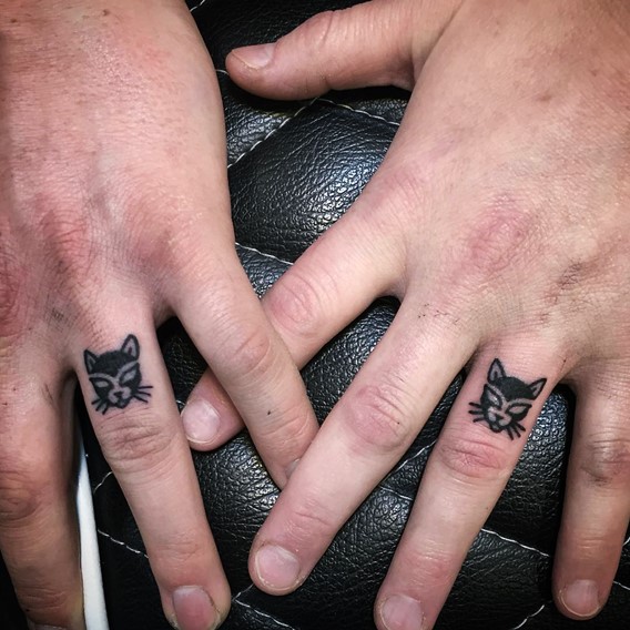 Small Cat Face Matching Tattoos On Fingers