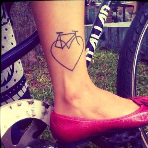 Small Cycle With Heart Design Tyres Tattoo On Leg