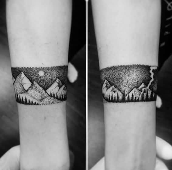 Small Dotwork Mountains With Trees Tattoo on Forearm