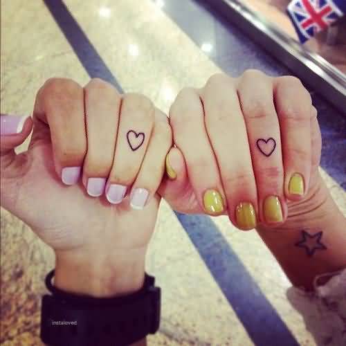 Small Heart Outline Matching Tattoos On Fingers