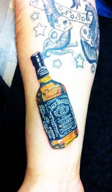 Small Jack Daniel Bottle With Outline Stars Tattoo On Leg