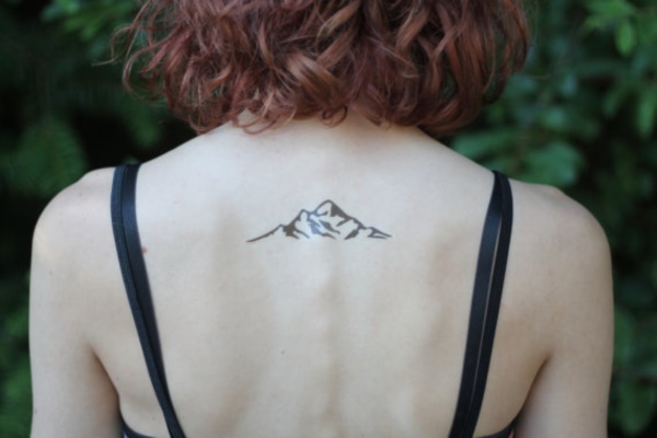 Small Mountains Tattoo On Upper Back