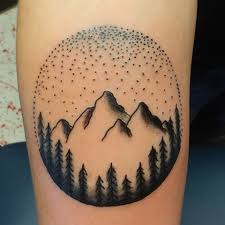 Small Mountains With Pine Trees In Circle Tattoo