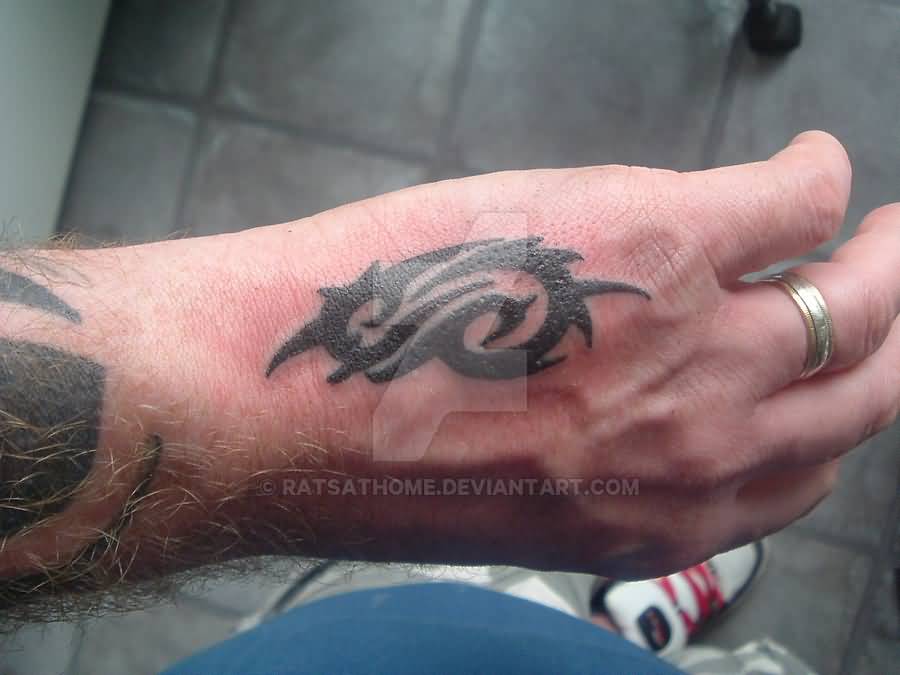 Small Slipknot Tribal Logo Tattoo On Hand