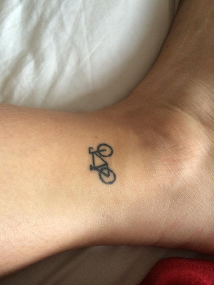 Smallest Black Ink Cycle Tattoo On Ankle