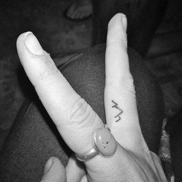 Smallest Mountains Simple Tattoo On Finger
