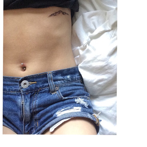 Smallest Mountains Tattoo On Side Rib