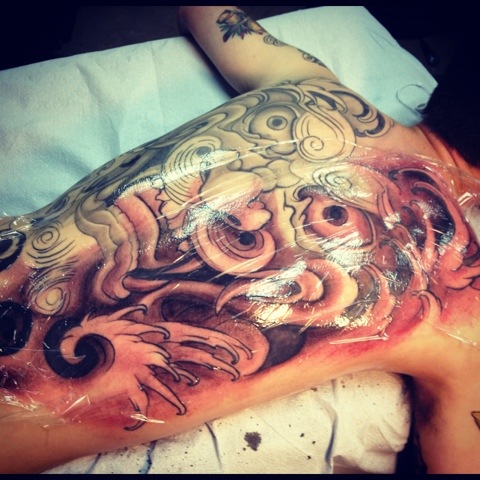 Stunning Angry Foo Dog Face Tattoo On Full Back
