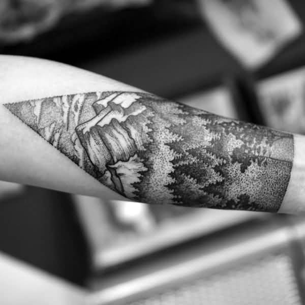 Stylized Black Ink Forest And Mountain Tattoo On Arm Sleeve