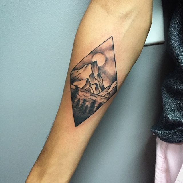 Superb Mountains And Trees In Diamond Shape Tattoo On Forearm