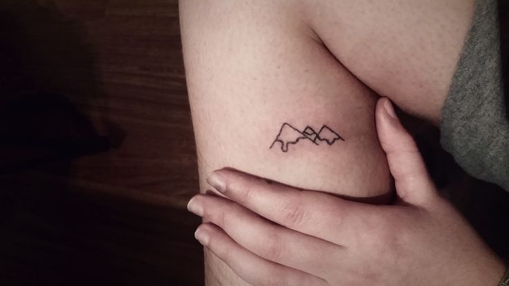 Tiniest Mountain Tattoo On Leg