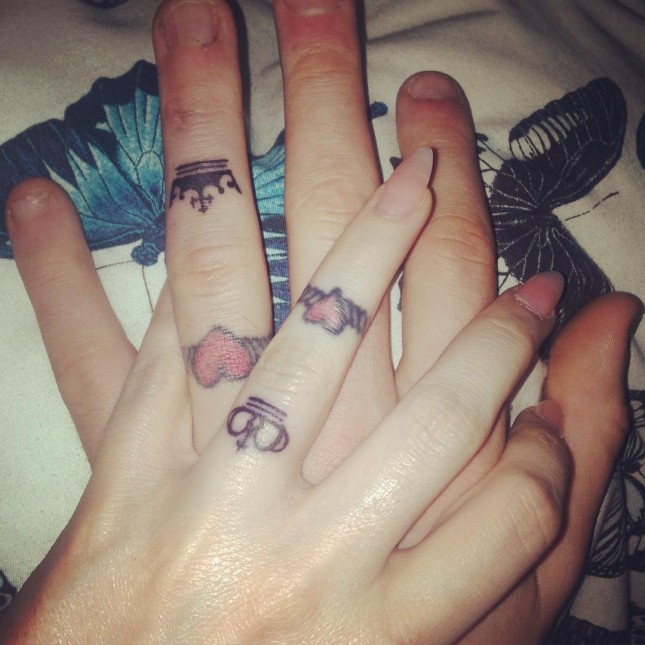 Tiny Crowns With Heart Shaped Ring Matching Tattoos On Fingers