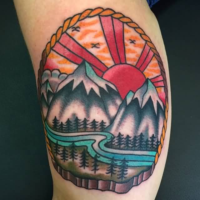 Traditional Mountains With Pine Trees And Rising Sun Tattoo On Forearm