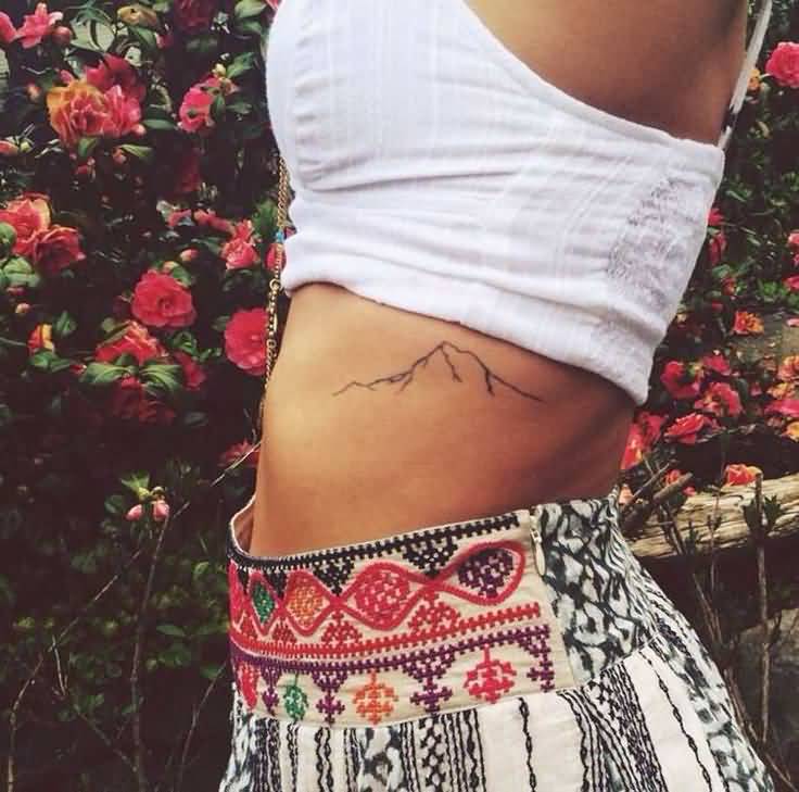 Very Simple Mountains Tattoo On Side Rib