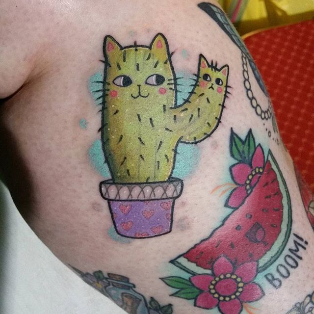 Watermelon And Cat Face Cactus With Flowers Tattoo On Leg
