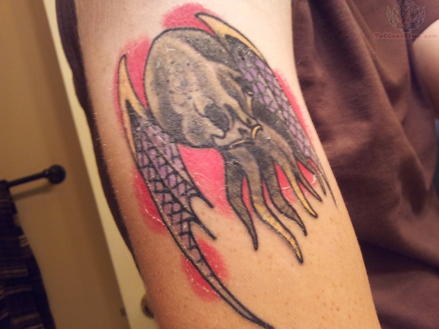 Winged Cthulhu Tattoo On Right Bicep