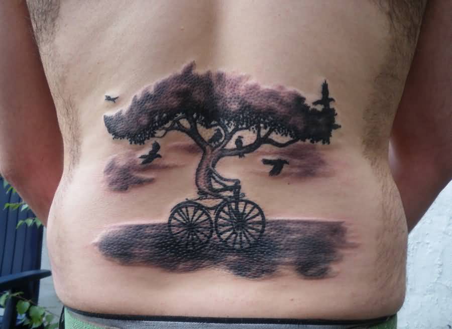 Wondeful Tree Riding Cycle Tattoo On Lower Back By Zakknoir