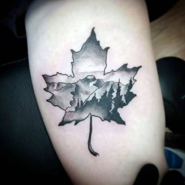 Wonderful Mountains And Trees In Maple Leaf Tattoo