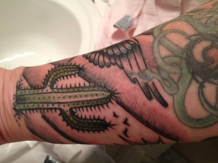 Wonderful Traditional Saguaro Cactus With Bird And Sky Tattoo