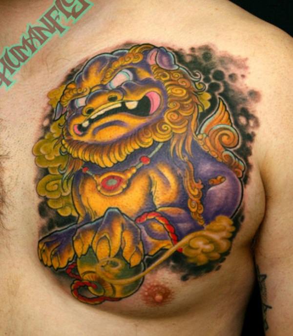 Wonderful Yellow Color Foo Dog Tattoo On Left Chest