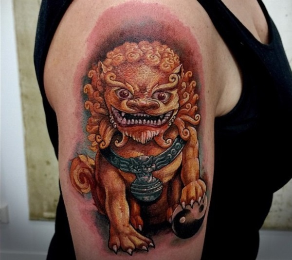 Yellow Colored Foo Dog Tattoo On Right Shoulder