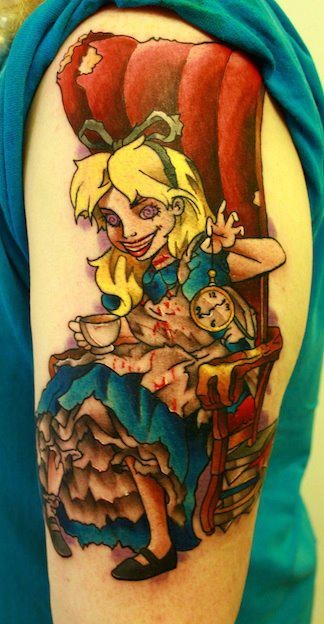 Alice In Wonderland Tattoo On Left Half Sleeve