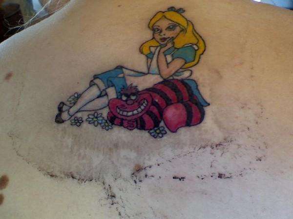 Alice In Wonderland Tattoo On Upper Back