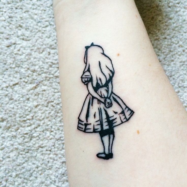 Alice in Wonderland Girl Tattoo on Arm