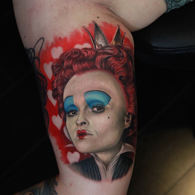Alice in Wonderland Tattoo On Bicep