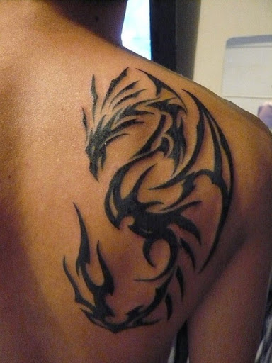 Amazing Dragon Tribal Tattoo On Right Back Shoulder For Men