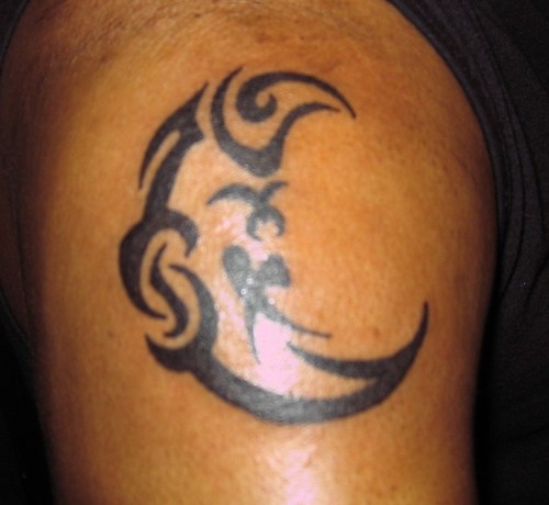 Amazing Small Tribal Half Moon Tattoo On Left Shoulder