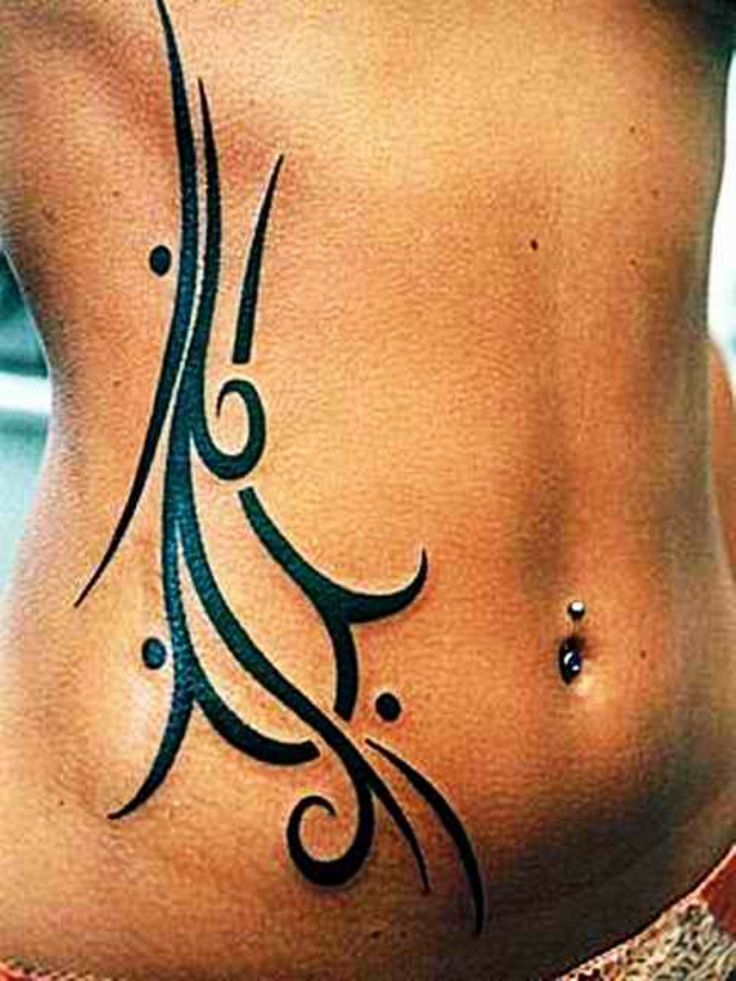 Amazing Tribal Design Tattoo On Right Side Rib To Hip