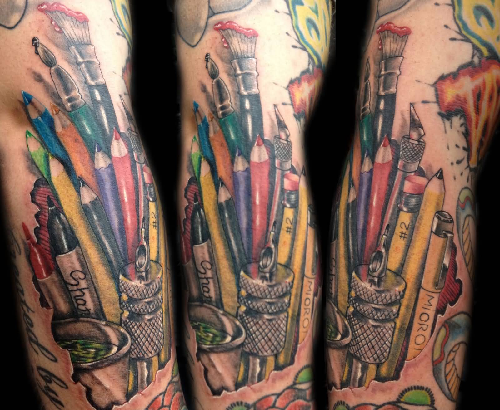 Artistic Brush And Pencils Tattoo On Sleeve