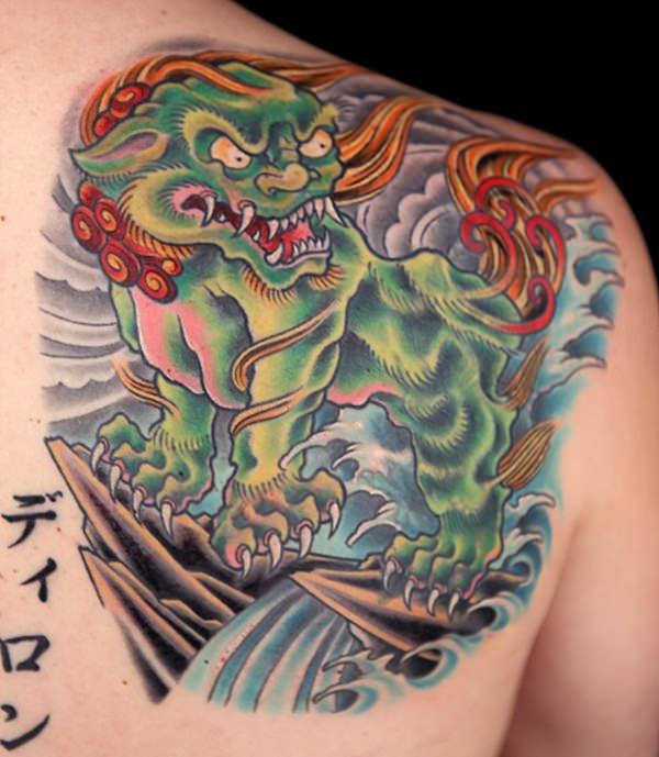 Attractive Colorful Foo Dog Tattoo On Upper Back