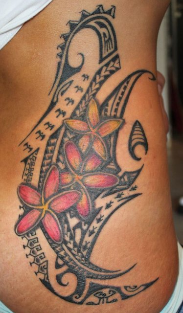Attractive Polynesian Tribal With Flower Tattoo On Side Rib