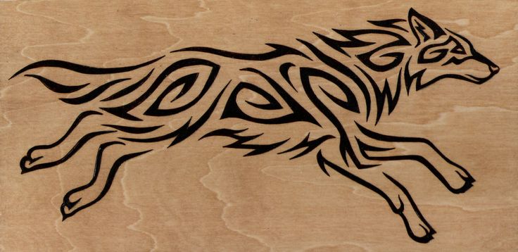 Attractive Tribal Wolf Running Tattoo Design