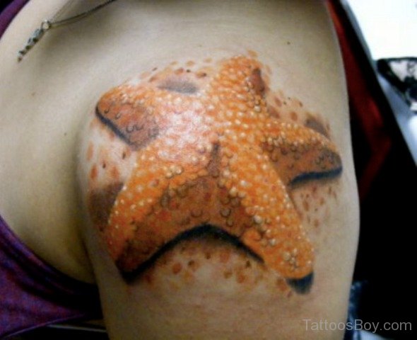 Awesome 3D Orange Starfish Tattoo On Left Shoulder