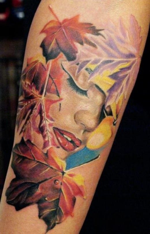 Awesome Girl Face Ands Fall Leaves Tattoo by Michele Turco