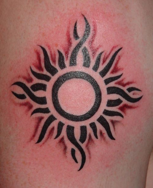 Awesome Small Black And Grey Tribal Sun Tattoo