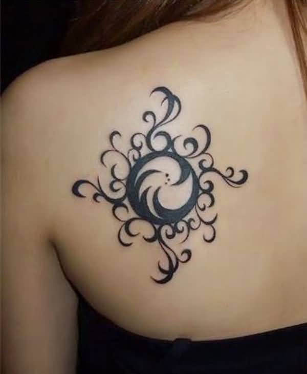 Beautiful Small Tribal Sun Tattoo On Left Back Shoulder