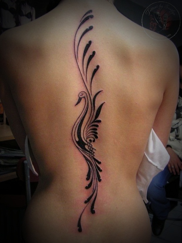 Beautiful Tribal Bird Tattoo On Spine Chord For Women